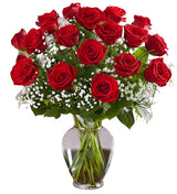 18 Premium Red Roses Arranged in a vase with filler