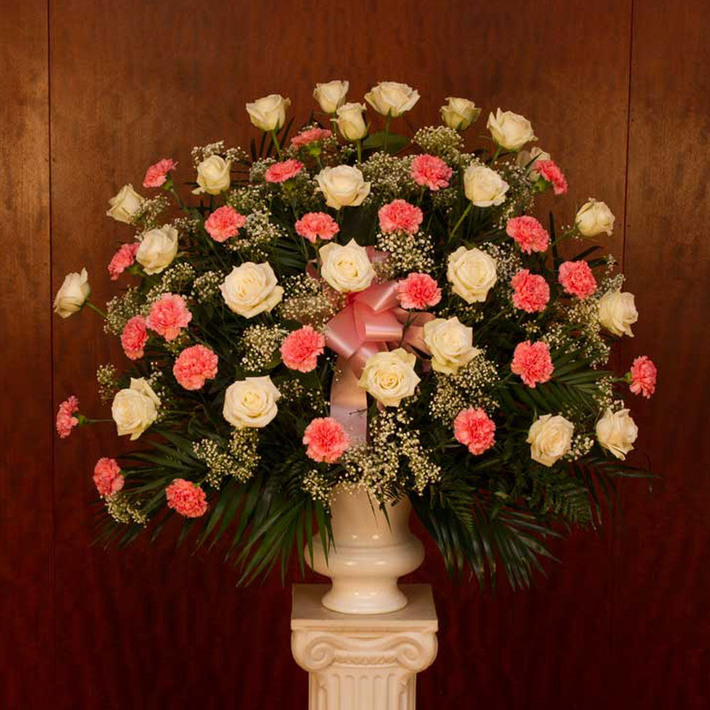 24 Carnations and 24 Roses in a funeral basket