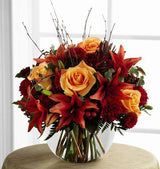 Autumn Beauty Bowl of orange and rust flowers in glass bubble bowl Medium