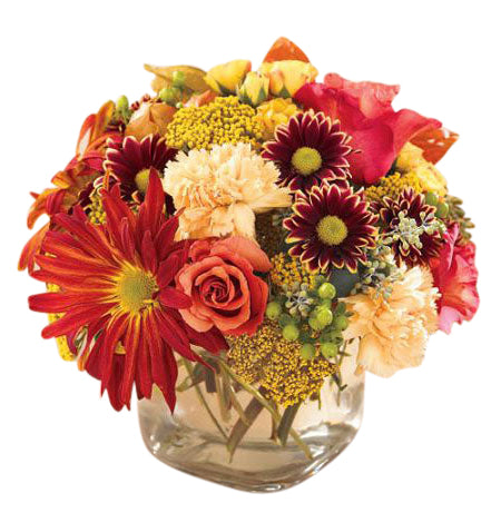 Fall flower arrangement in a small cube vase