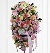 Blessings of the Earth funeral flower standing spray of pink lilies, blue hydrangea, carnations and stock Large