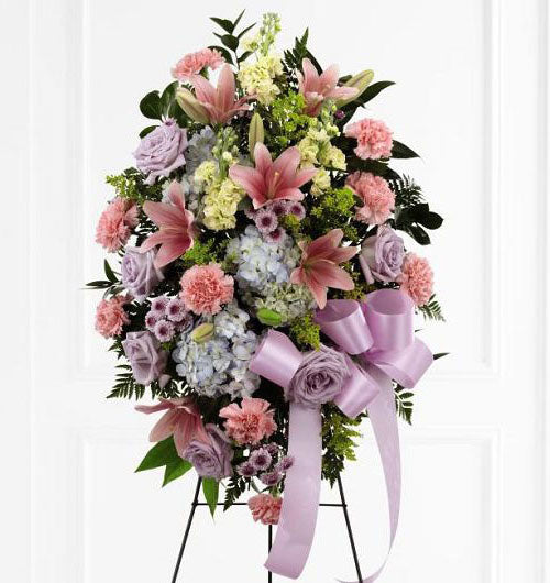 Blessings of the Earth funeral flower standing spray of pink lilies