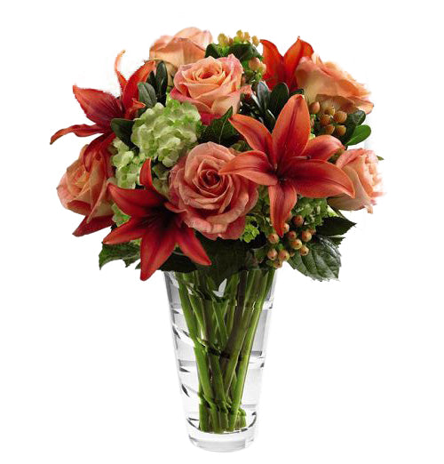 FTD Dawning Delight Bouquet by Vera Wang with assorted orange flowers and green hydrangea Medium