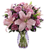 FTD Garceful Wonder Bouquet with assorted pink and lavender flowers in shimmering vase Medium