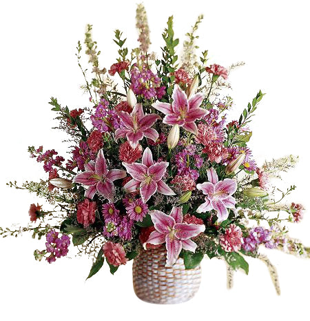 One sided funeral flower arrangement of assorted pink flowers with stargazer lilies