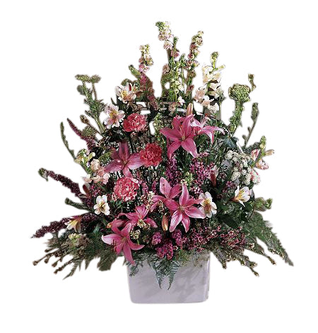 One sided funeral flower arrangement of assorted pink flowers