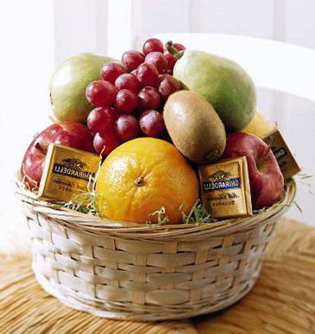 Assorted seasonal fruit in wicker basket