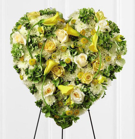 Glowing Ray Funeral Flower Heart Standing spray of all yellow flowers