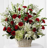 White sympathy basket arrangement of fresh lilies, hydrangea and red roses for funeral Large