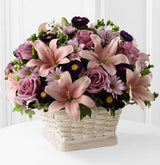 Sympathy basket of flowers in shades of pink and purple Medium