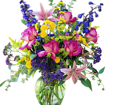 Pink, yellow, and purple flowers in a vase with roses