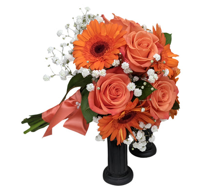 Orange rose and orange gerbera daisy clutch bouquet for prom