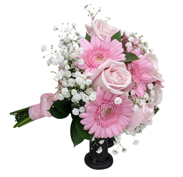 Pink rose and pink gerbera daisy clutch bouquet for prom