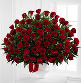 Soul's Splendor funeral flower arrangement of all red roses in a white urn Large