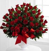 Soul's Splendor funeral flower arrangement of all red roses in a white urn Medium