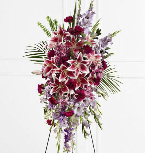 Tender touch funeral flower standing spray with purple gladiola, purple larkspur and stargazer lilies Large