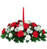 Traditional holiday centerpiece of red and white flowers with taper candles Medium