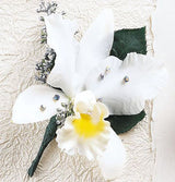 White orchid corsage with rhinestone accents