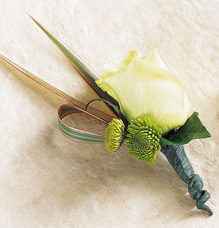 Unique white rose boutonniere