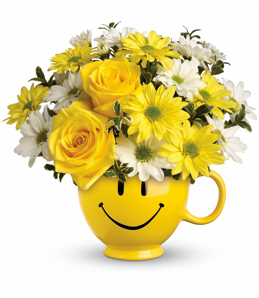 Teleflora Be Happy Yellow Smiley Face Mug with flowers Standard