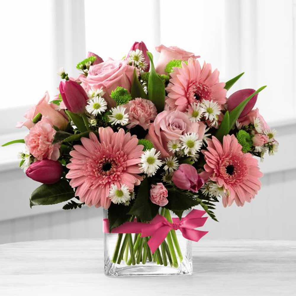 Blooming Visions Bouquet of assorted pink flowers in glass cube Large