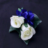 blue and white silk flowers on boutonniere