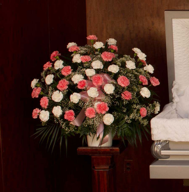 Carnation Funeral Basket with pink and white carnations