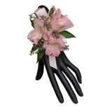 Cherish corsage - pink peruvian lily corsage with greens