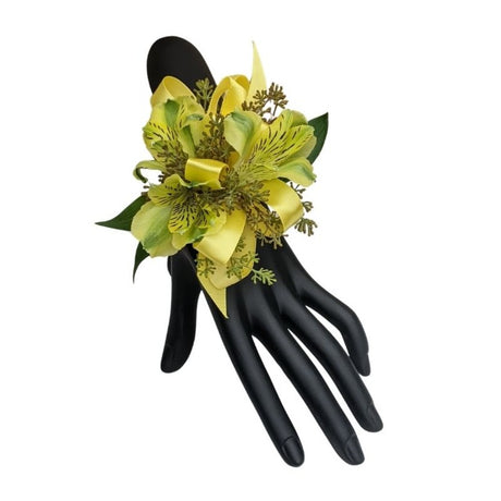 Cherish corsage - yellow peruvian lily corsage with greens