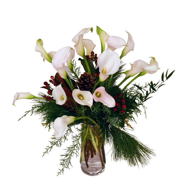 Christmas Calla lilies in cylinder case with pine cones and holiday accents