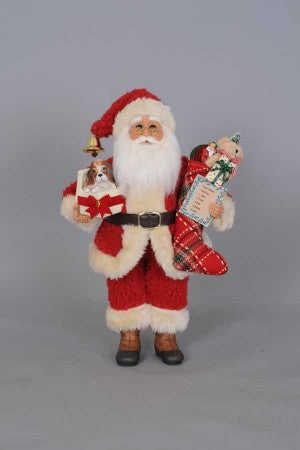 Tabletop Santa Claus holding gifts