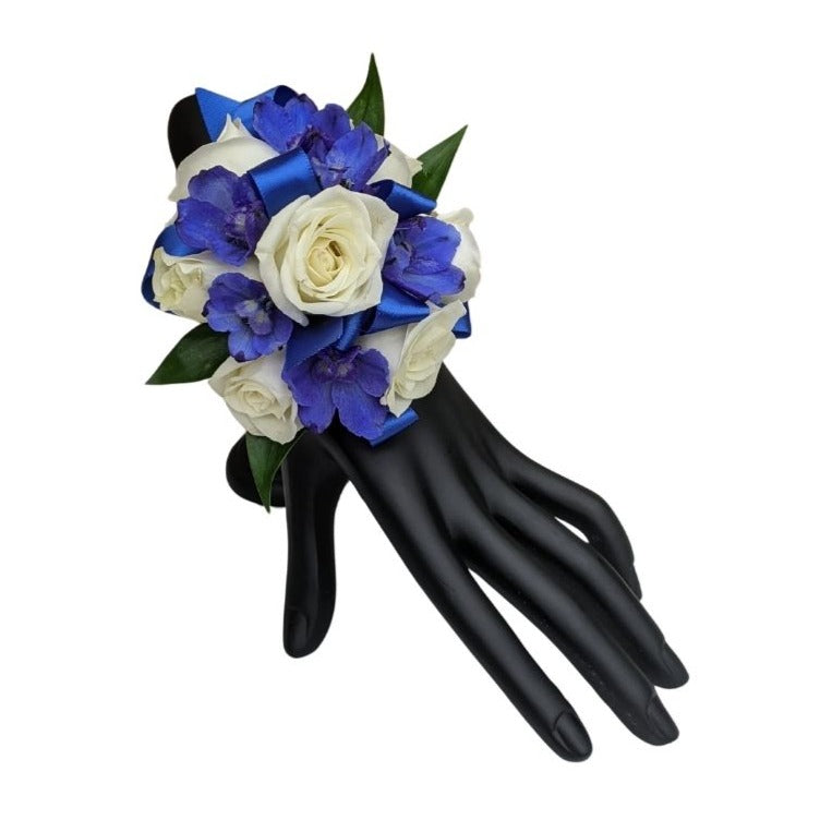 Blue and white flower wristlet corsage