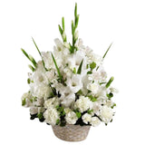 White handle basket filled with assorted white sympathy flowers Large