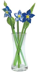 Glass forget me not flowers in vase