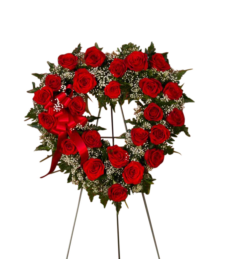 Red roses on open heart shaped wreath