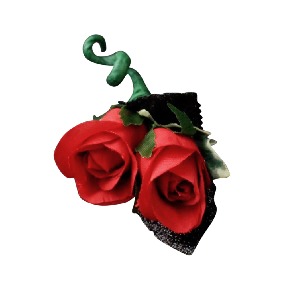 Silk red roses on boutonniere for prom