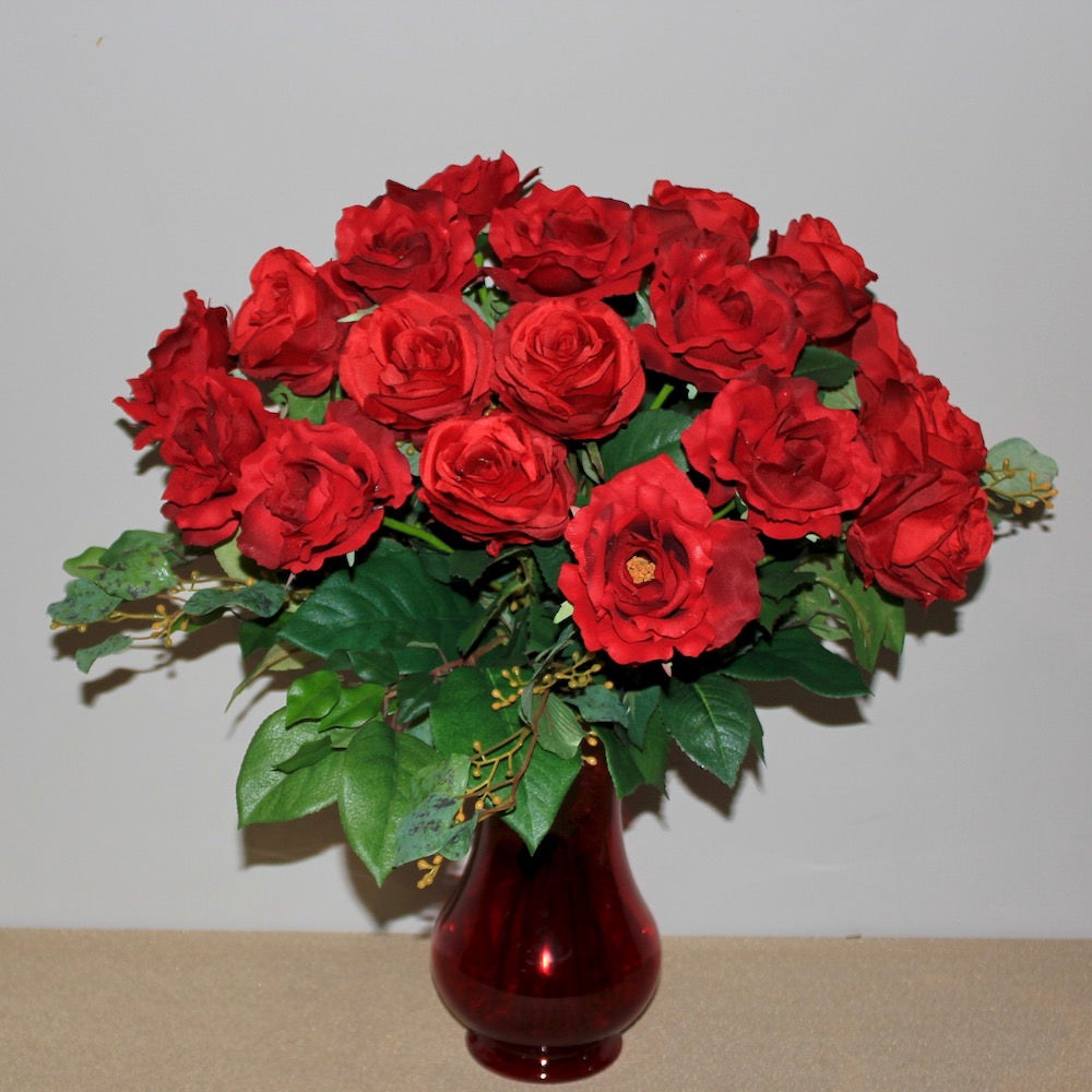 18 silk red roses arranged in a vase