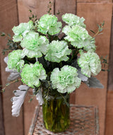 St Paddy's day green carnations in a vase