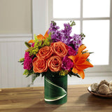 Sunset Sweetness Bouquet in leaf wrapped vase Medium