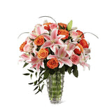 Sweetly Stunning Bouquet of orange and pink flowers in vase Deluxe