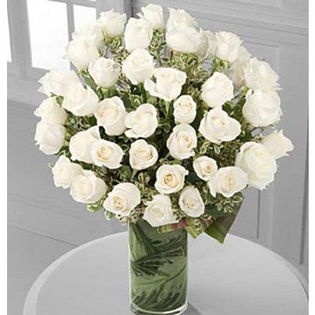 Luxury white roses in cylinder vase